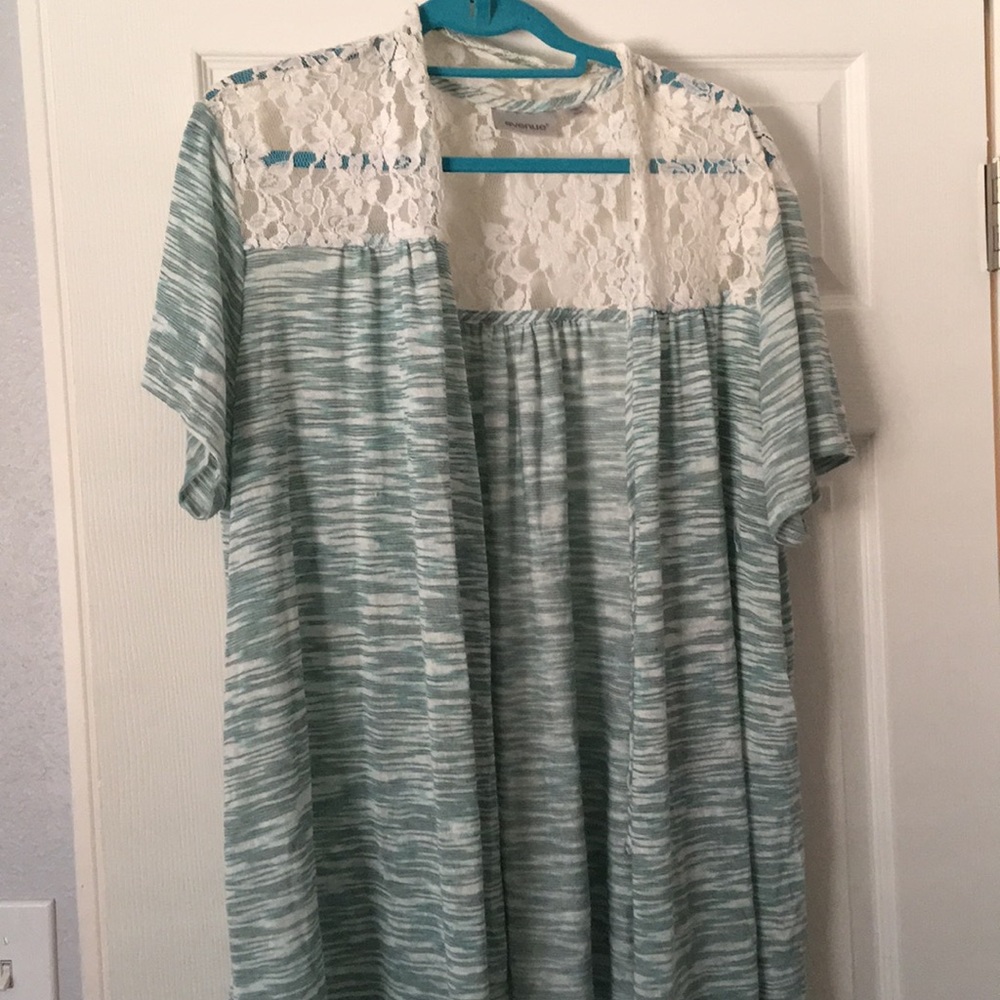 A blue with lace shrug. Rarely been worn.